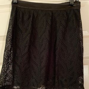 Black lace skater shirt by Nollie